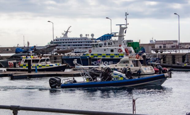 A police boat pulls out of a Gibraltar harbour