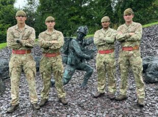 4 soldiers from the Royal Gibraltar Regiment.