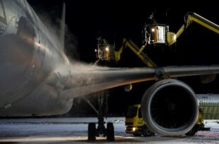 Plane being de-iced