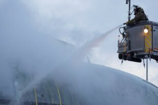 A plane being de-iced