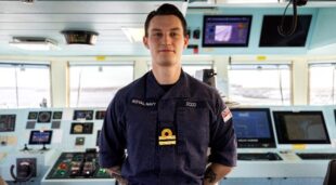 Portrait of Lt Dodd, Officer of the Watch in the Ops room on HMS FORTH.